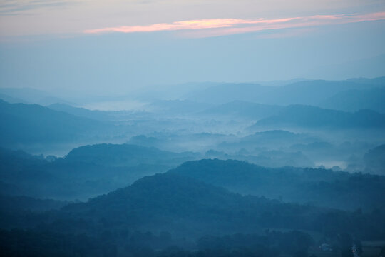 Aerial view of Appalachian forest shrouded in morning fog