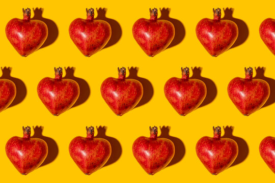 Pattern of heart shaped pomegranates