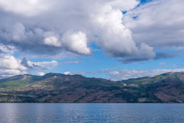 View at Mountain Lake with Dramatic Clouds in British Columbia, Canada.