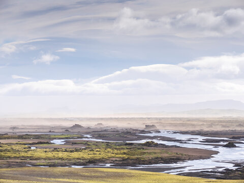 Scenic view of landscape with sandstorm against sky, Lakagigar, Iceland