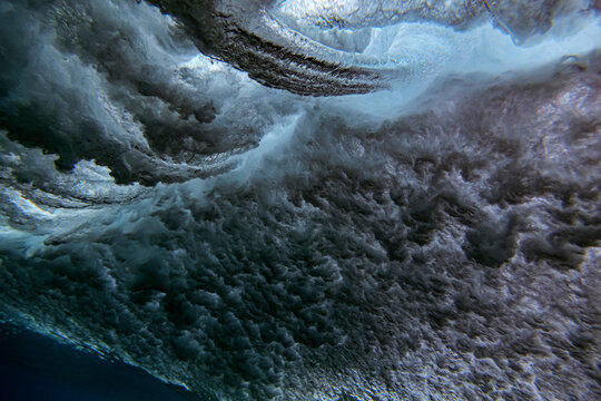 Underwater view of splashing sea wave