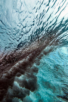 Underwater view of splashing wave