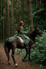 Gourmet lady in a vintage dress. A beautiful rider gently hugs the horse. Artistic Photography