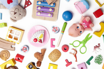 Big group of children's toys on white background, top view.