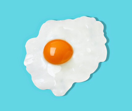 Fried egg against blue background