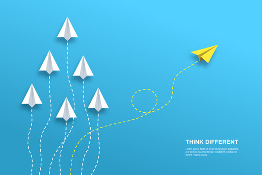 Think differently concept. Yellow airplane changing direction. Concepts: change, unique, trend, courage, innovation, different.