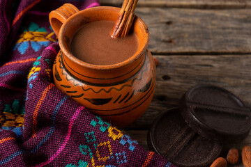 Mexican hot cocoa on wooden background