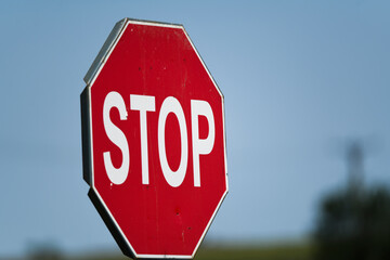 stop sign on a country road