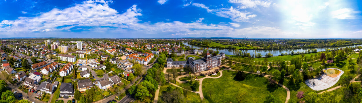 Germany, Hesse, Hanau, Helicopter view of town on bank of river Main in summer