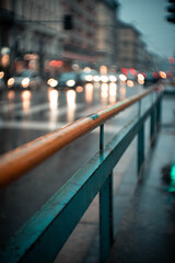green and yellow barrier in the rainy city