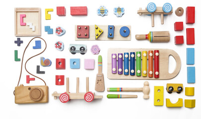 Colorful wooden children's eco friendly, sustainable toys, flat lay on white background