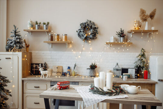 Photo Of Decorated Before Christmas Holidays Kitchen With Xmas Tree Wreath Wooden Decor Electrical Lights Candles Cozy Interior