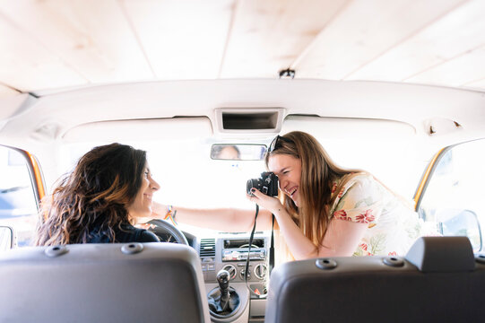 Two Women Having A Foto Shooting In A Camper