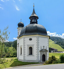 The Seekirchl also Heiligkreuzkirche is the most famous landmark of Seefeld in Tirol