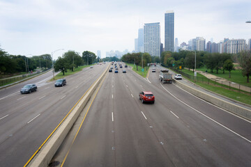 Highways leading in Chicago with highrise buildings ahead