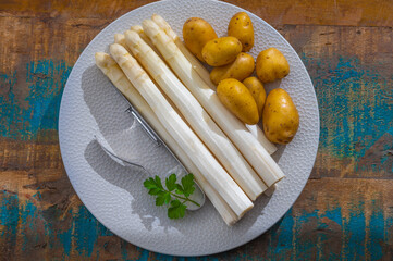 Ingredients for spring vegetarian dinner, high quality Dutch white asparagus, washed and peeled on...