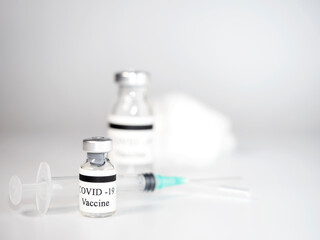 Medical plastic syringe in water color with glass vial with coronavirus vaccine COVID-19 isolated in white background. Vaccination concept. 