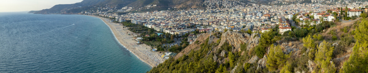 Fototapeta na wymiar Western Alanya, Tyrkey panorama in high resolution observed from a Fortress of Alanya with famous Cleopatra beach on a shore.