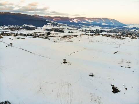 Camporovere, Altopiano di Asiago during winter season. Aerial drone view