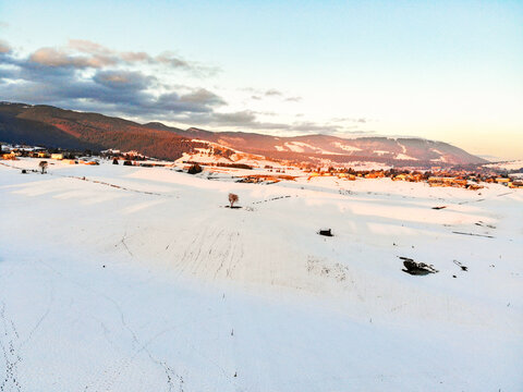 Camporovere, Altopiano di Asiago during winter season. Aerial drone view