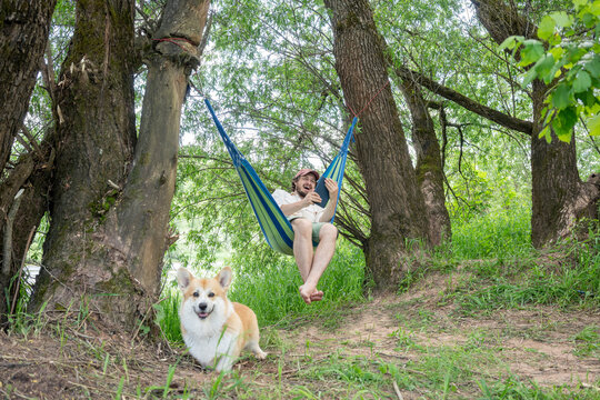 Man relaxing on hammock in the forest