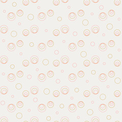 Seamless pattern of circles on a cream background