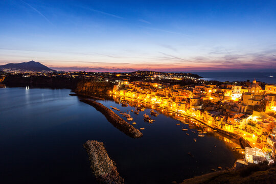 Illuminated townscape on Marina Corricella on Procida Island