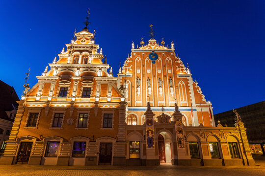 Latvia, Riga, Illuminated House of the Blackheads at night