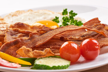 Fried Bacon with eggs, american breakfast