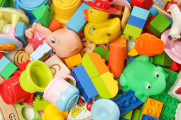 Pile of various colorful children's toys.	