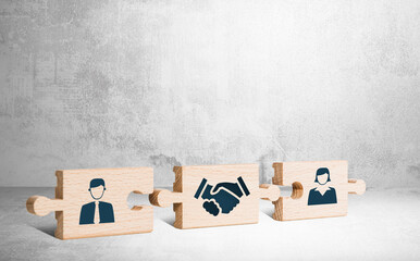 Wooden puzzle with icons of a man, mediator and woman. The concept of the role of a mediator in saving the family, mediation. - obrazy, fototapety, plakaty