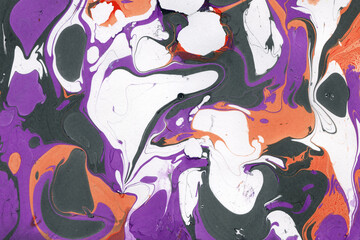 Colorful marble ink texture on watercolor paper background. Marble stone image. Bath bomb effect. Psychedelic biomorphic art.
