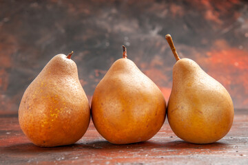 front view sweet pears on dark background fruit pulp tree apple photo