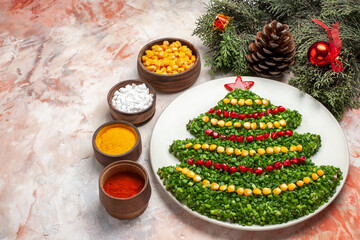 front view green salad in new year tree shape with seasonings on light background salad meal color xmas photo
