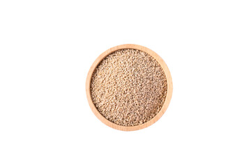 Raw brown quinoa seeds in a wooden bowl isolated on white background, Top view