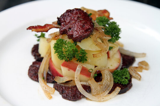 German dish called Heaven and Earth. Blood sausage, fried onions and mashed potato with apple sauce