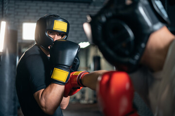 two muscle boxers sport man training and fighting on boxing ring at gym