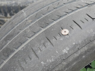 screw punctured in the car tire by accident.