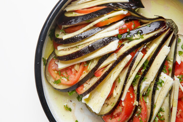 Homemade ratatouille dish in tray before baking
