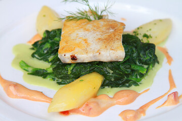 Sea Bream with sauce Choron, spinach and parsley potatoes