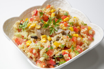 Millet salad with chopped fresh vegetables