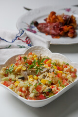 Millet salad with chopped fresh vegetables