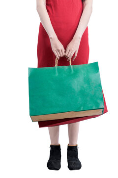 The woman carrying shopping bags