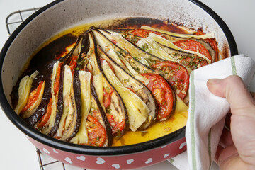 Homemade ratatouille dish in round tray
