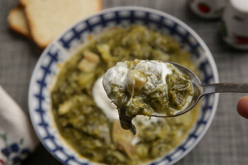 Collard dish. Delicious homemade coolard stew served in in a bowl.
