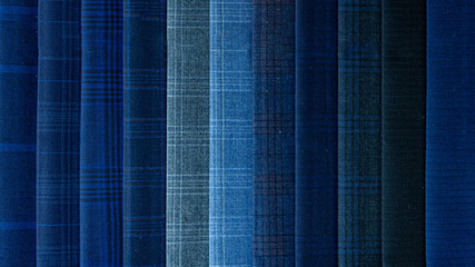 Close up of the pattern of the fabric for cutting the suit. Fabric texture background.