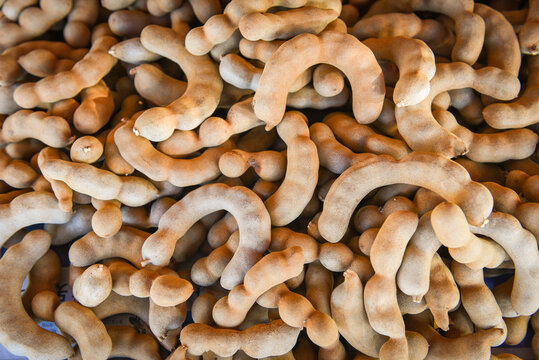 tamarind for sale in the market fruit, fresh tamarind texture background.