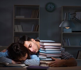 Two students studying late at night