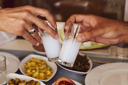 Turkish and Greek Traditional Dinning Table with Special Alcohol Drink Raki. Ouzo and Turkish Raki is a dry anise flavoured aperitif that is widely consumed in Turkey, Greece, Cyprus and Lebanon