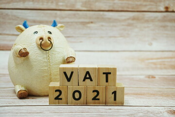 VAT 2021 alphabet letter on wooden background